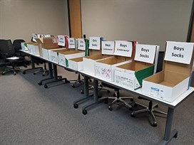 Image of boxes with clothing labels 