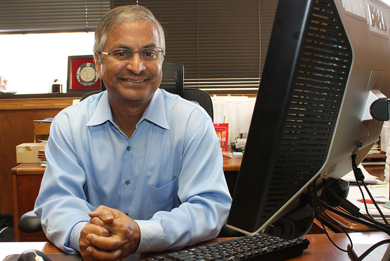 Dr. Akhil Datta-Gupta at desk