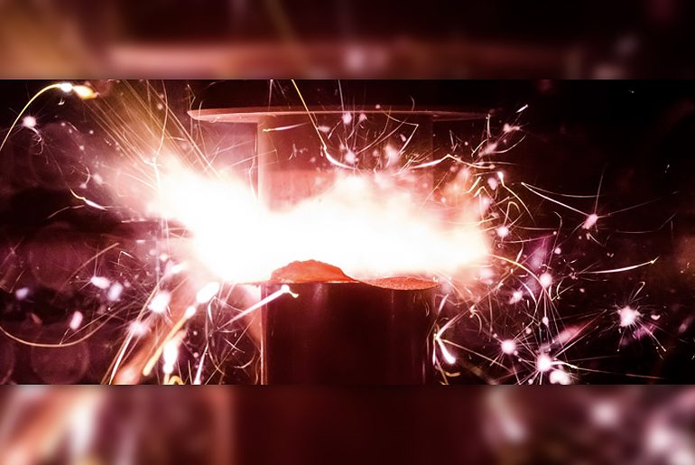 Close up of machinery creating sparks