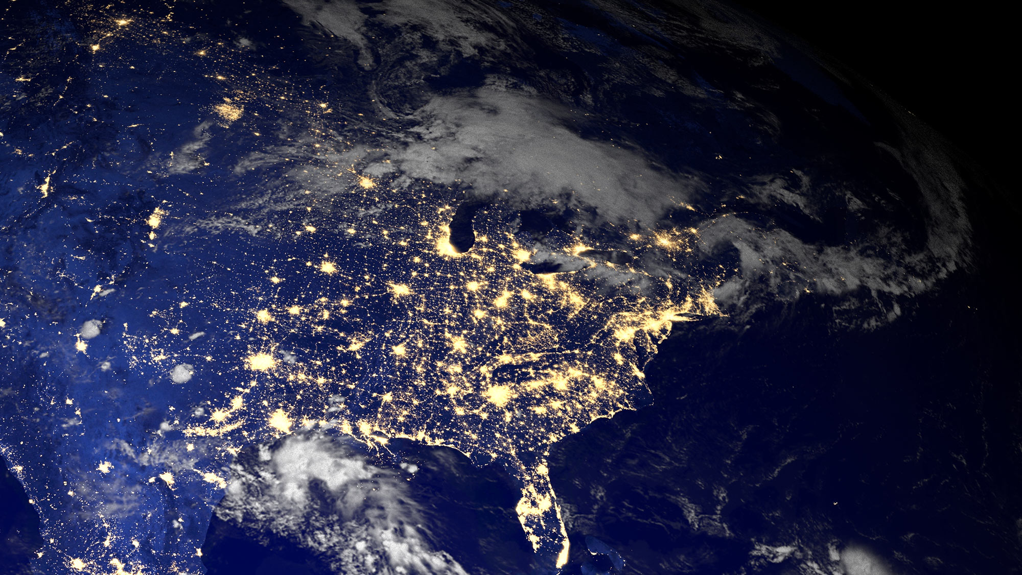 Outer space shot of America with city lights.