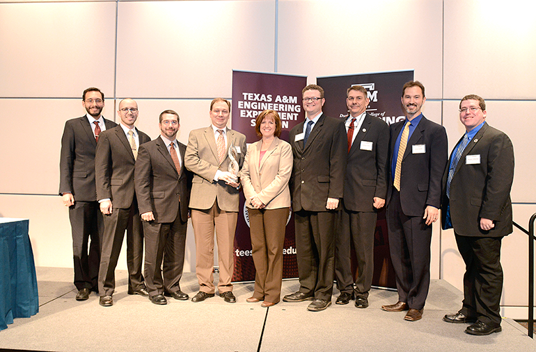 Banks and staff members from the Texas Center for Applied Technology, winners of the Engineering Team Award.