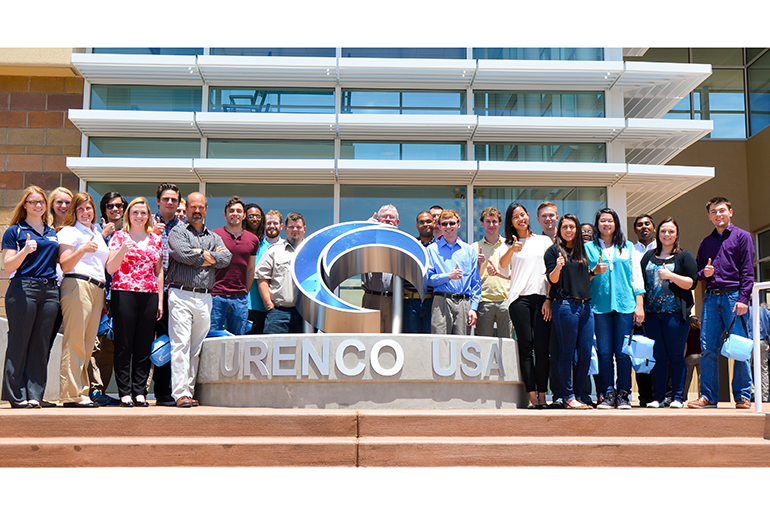 Students from the Texas A&amp;M University Department of Nuclear Engineering and Prairie View A&amp;M University Taking A Picture With A Statue With Words of URENCO USA