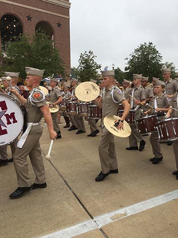 Nicholas Rossi marching with the Fightin' Texas Aggie Band