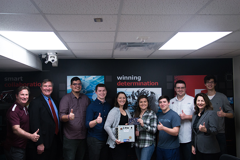 Texas A&amp;M University students with faculty and a local space commercialization company
