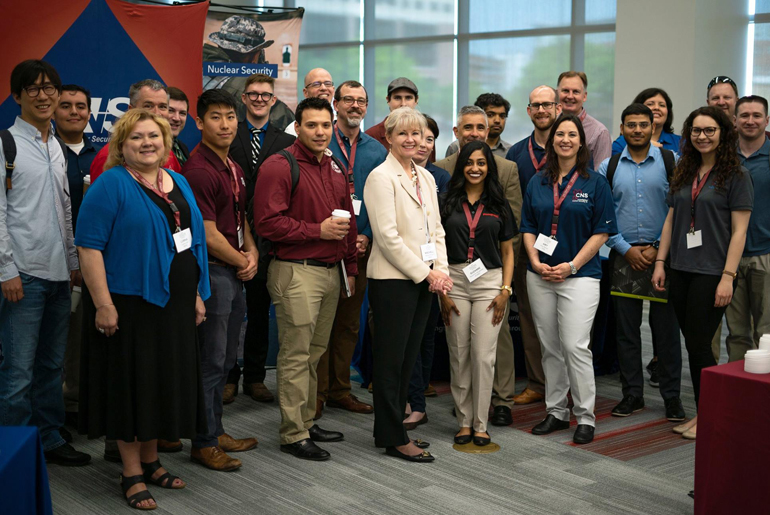 Dr. Donna Mischell Navarro, chief human capital officer for the National Nuclear Security Administration, with Nuclear Security Enterprise Day attendees.