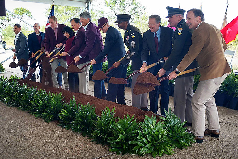 Officials break ground on the new Bush Combat Development Complex, named in honor of former President George H.W. Bush. 