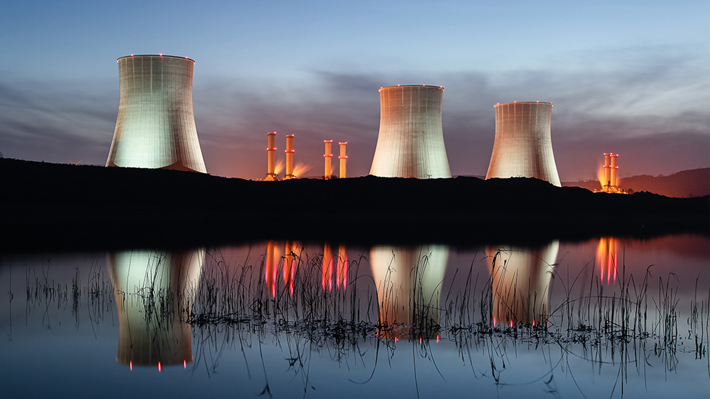 A nuclear power plant at sunset.