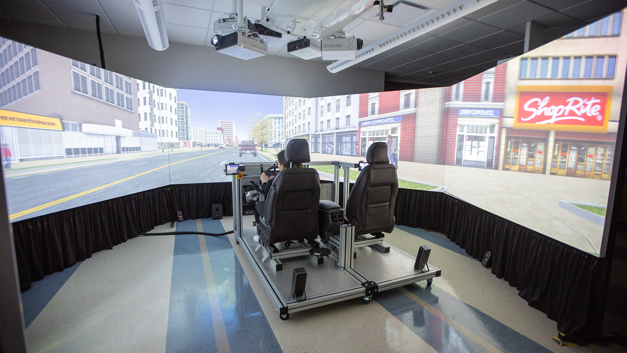 Dr. Maryam Zahabi uses the driving simulator located in the industrial and systems engineering department at Texas A&amp;M University. 
