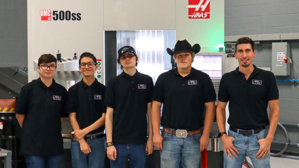 The Bryan Independent School District Career and Technical Education team, give young men standing side by side. Pictured from left to right: Nathan Sanchez, Martin O Campo, Ryan Hill, Clint Williams, and instructor Justin Gerzik.