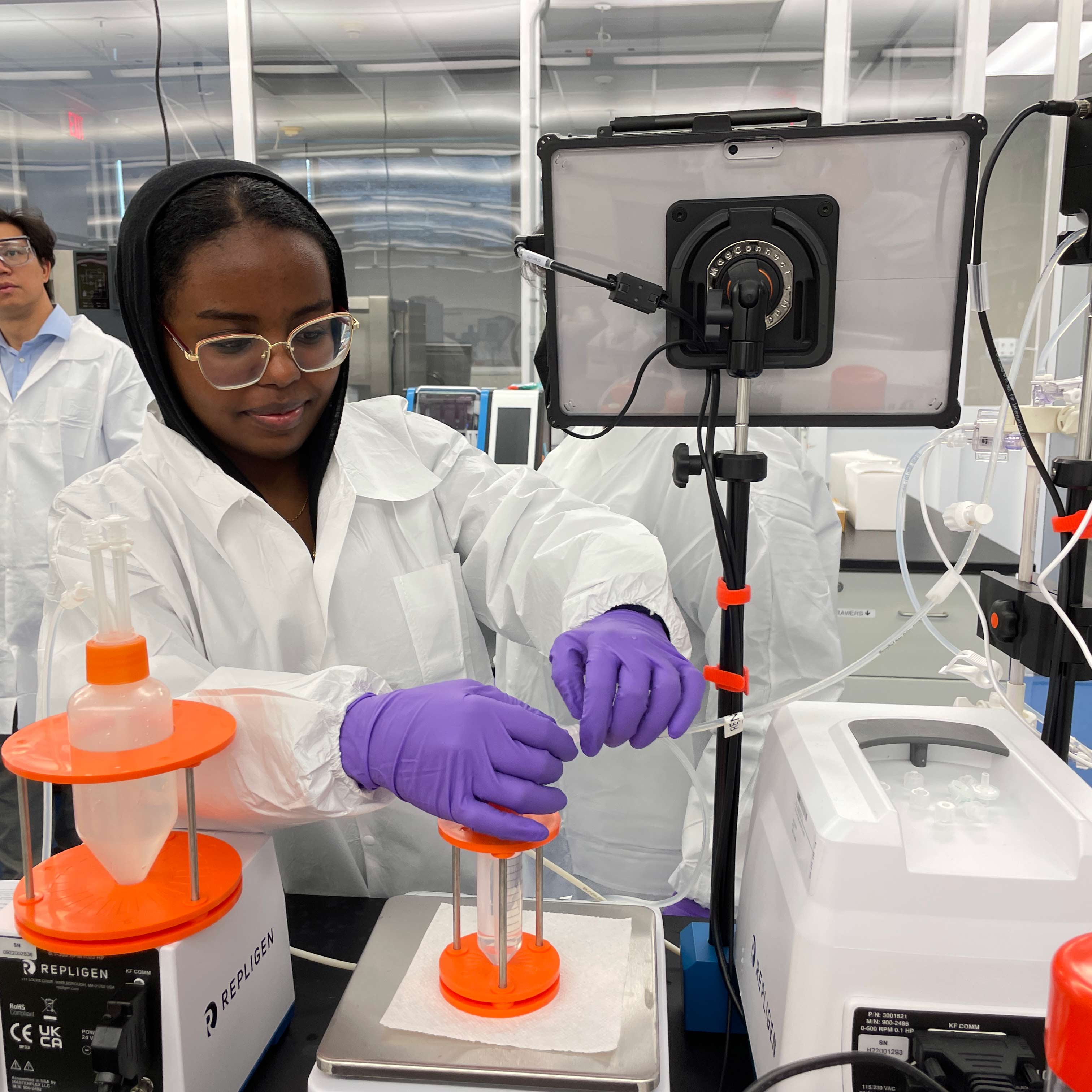 Student conducting research in a lab setting