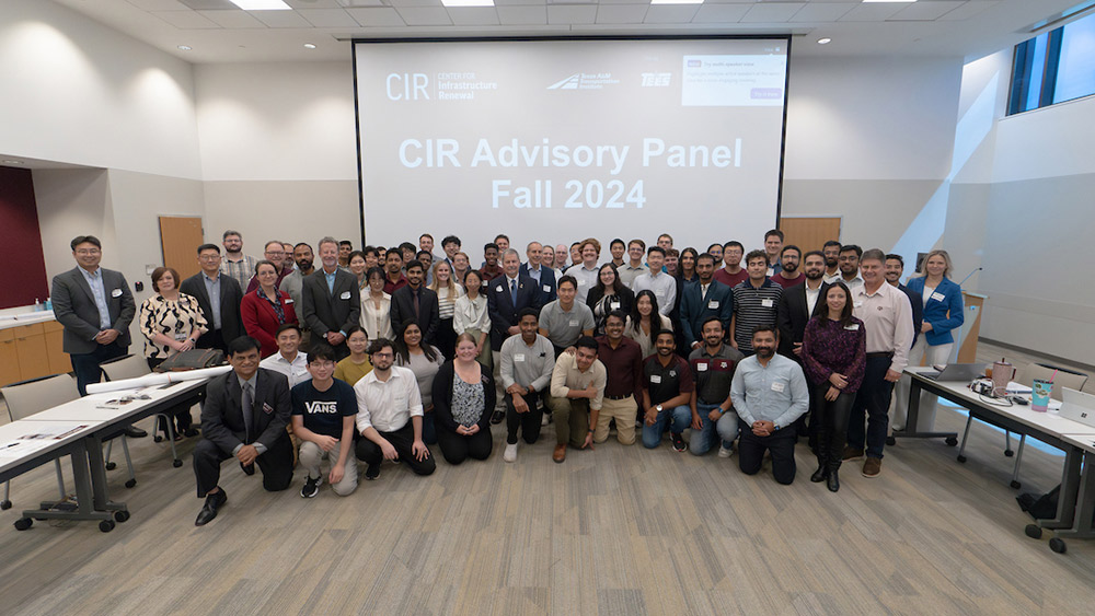 Large group of people standing in rows