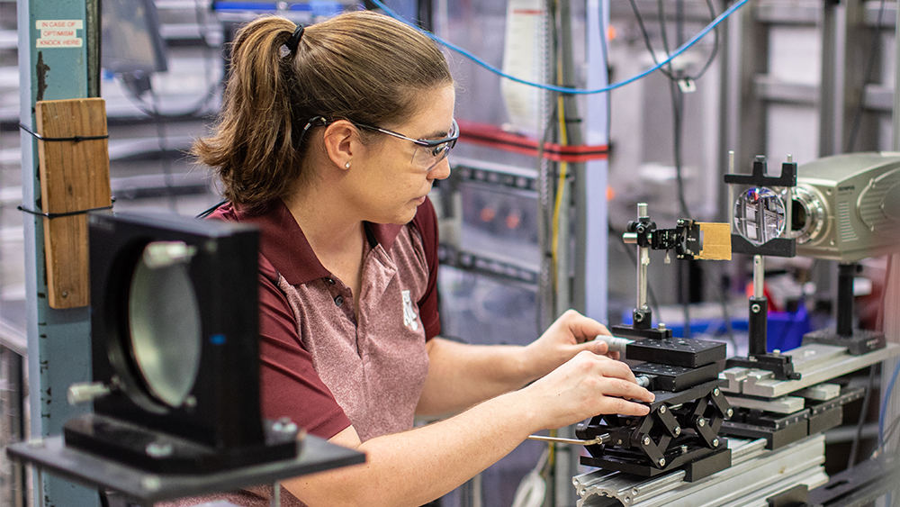 female studying hypersonics equipment